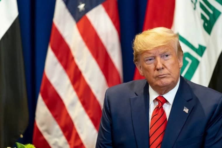 Image of Donald Trump in front of the US flag