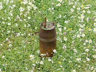 An unexploded bomb. Disgarded Israeli weaponry litters the fields around Bint Jbeil