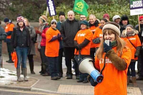 Striking council workers in their distinctive orange No to easyCouncil T-shirts